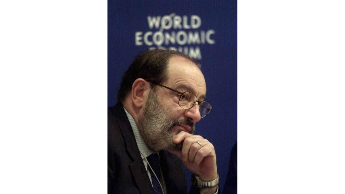 Italian author and philosopher Umberto Eco sits on a panel discussing the value of history and tradition during the World Economic Forum in Davos, Switzerland on Jan. 29, 2000.