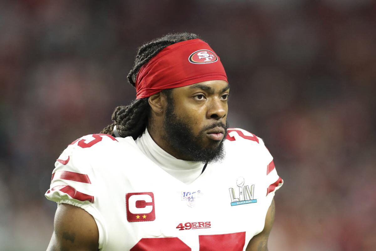 San Francisco 49ers cornerback Richard Sherman walks on the field.