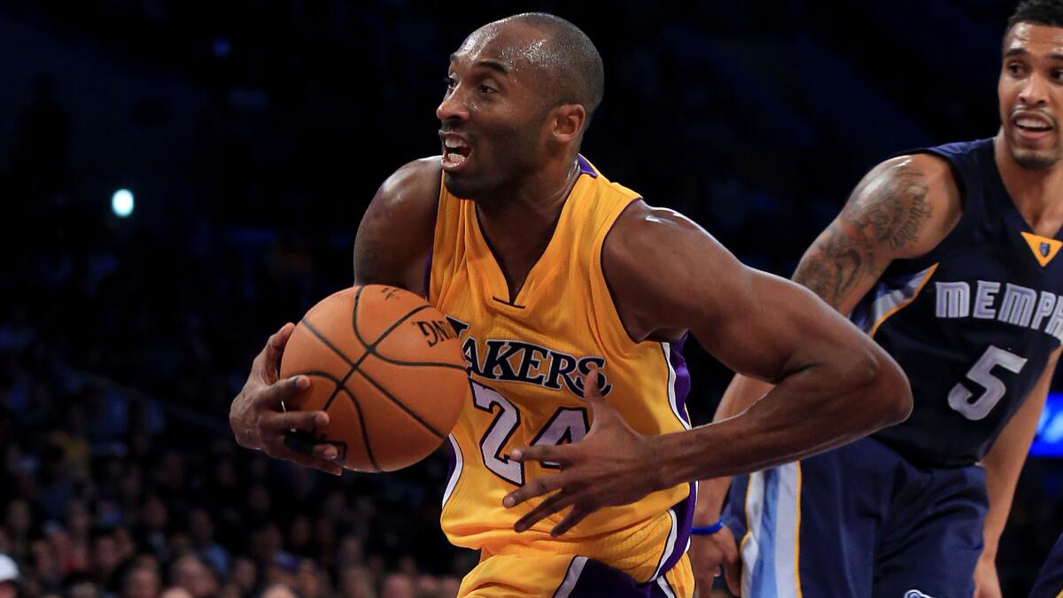 Lakers star Kobe Bryant drives to the basket during the fourth quarter of a 99-93 loss to the Memphis Grizzlies at Staples Center on Wednesday.