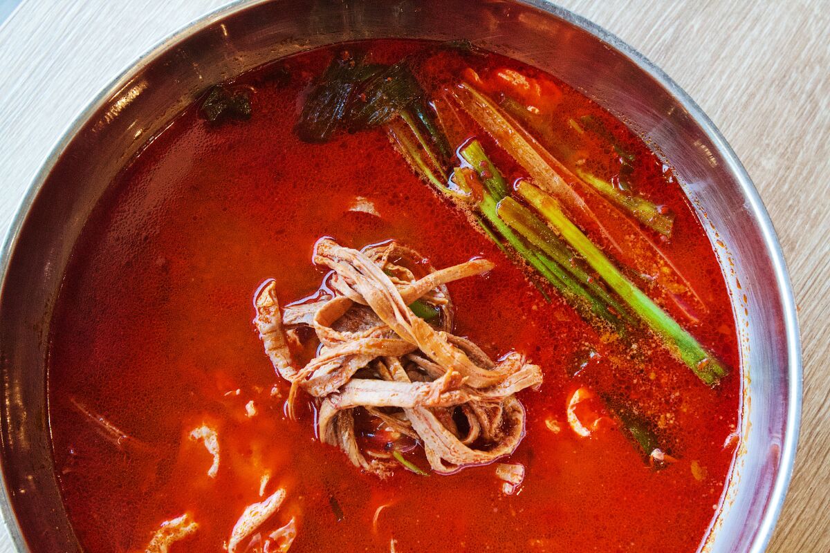 A bowl of spicy beef soup