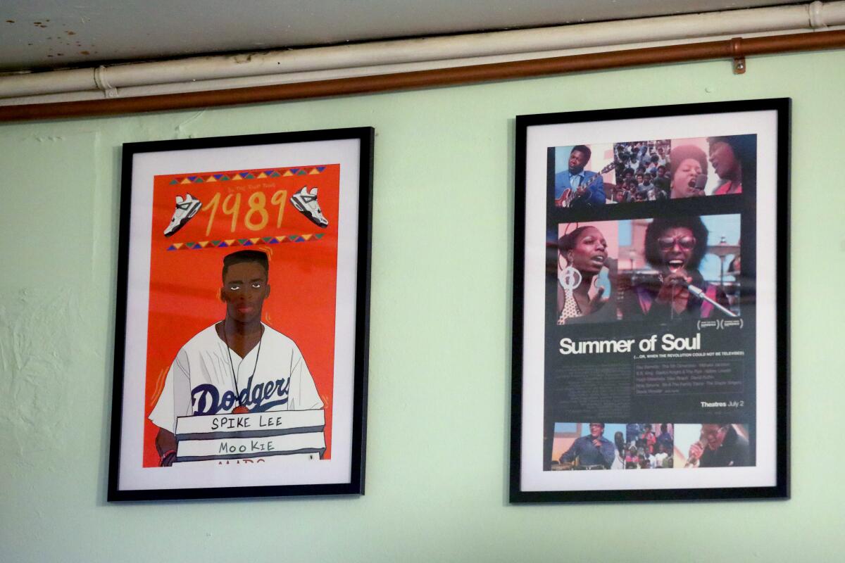 Spike Lee as Mookie from the movie "Do the Right Thing" hangs on a wall at the restaurant.