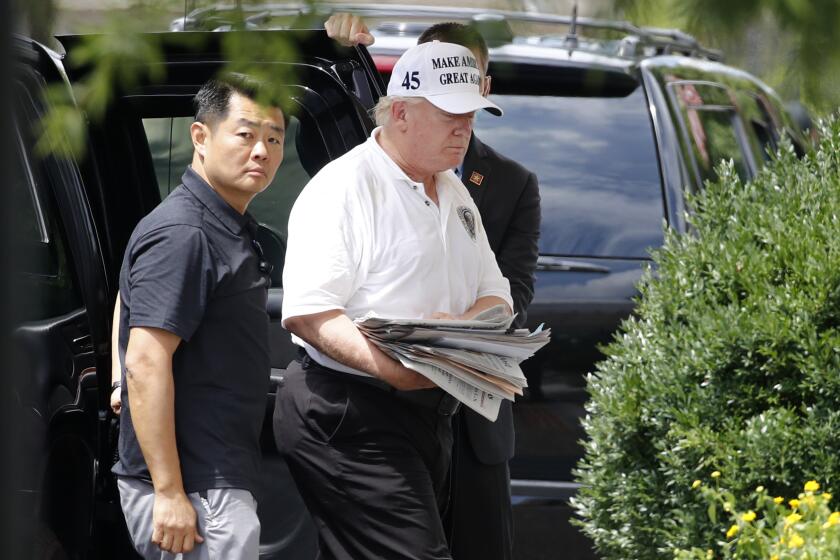 President Donald Trump arrives at the White House in Washington, Saturday, Aug. 1, 2020, as he returns from a visit to Trump National Golf Club in Sterling, Va. (AP Photo/Patrick Semansky)