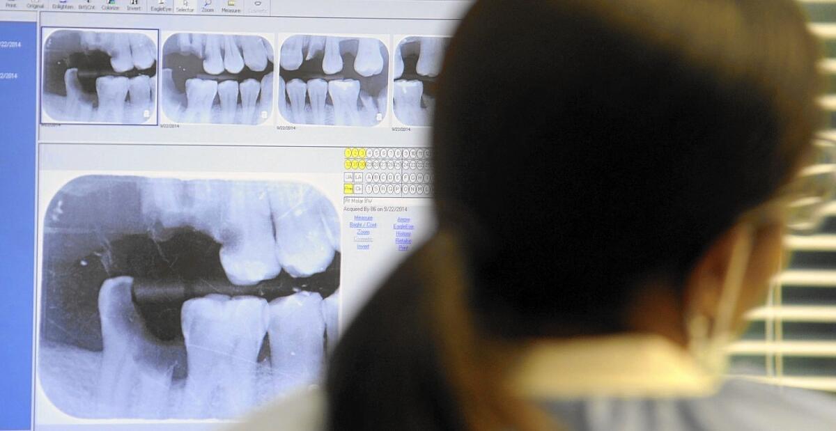 The Supreme Court is considering a case involving dentists in North Carolina who used a state board to block kiosks at shopping malls from offering teeth-whitening products. Above, a dentist's office in Largo, Fla.