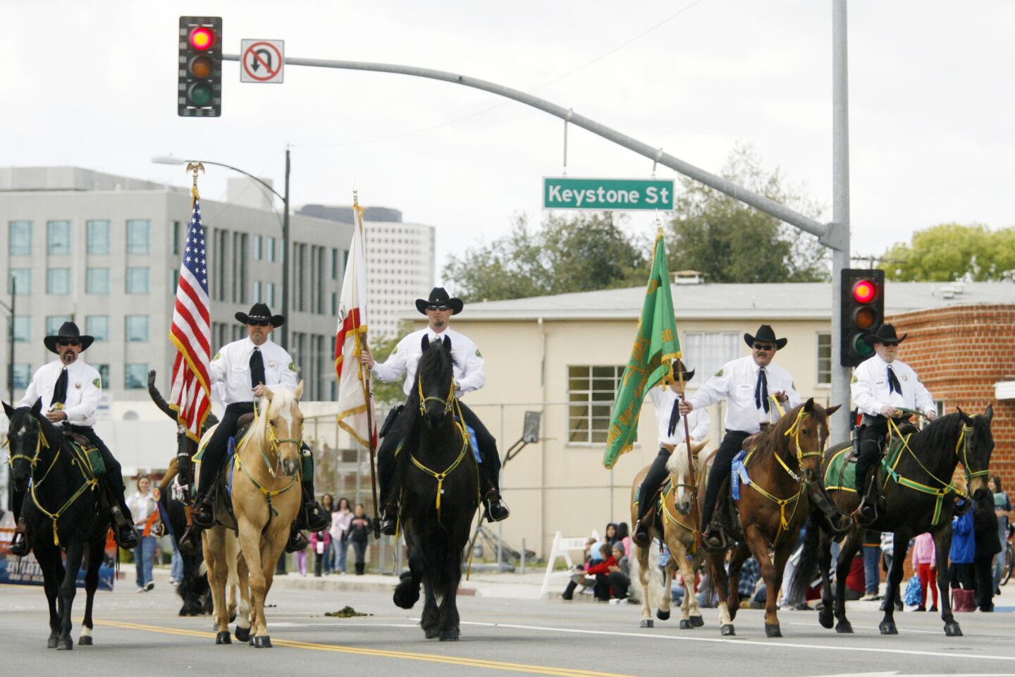 Participants march in Burbank on Parade, which took place on Olive Ave. between Keystone St. and Lomita St. on Saturday, April 14, 2012.