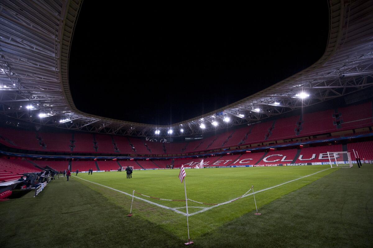 FILE - This Wednesday, Dec.10, 2014 file photo shows a general view of San Mames stadium in Bilbao, northern Spain. The Spanish soccer federation has on Friday, April 16, 2021 offered Sevilla as an alternative host city for the European Championships if UEFA rules out using Bilbao as planned. The federation has suggested that Sevilla’s La Cartuja Stadium could be used instead of Bilbao’s San Mames. Last week the federation ruled out allowing fans into San Mames due to the pandemic situation. (AP Photo/Alvaro Barrientos, file)