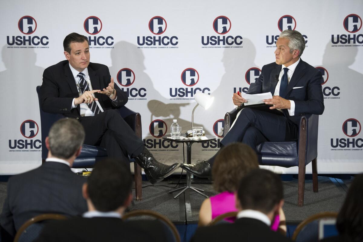 Republican presidential candidate Sen. Ted Cruz speaks with Javier Palomarez, president and CEO of the U.S. Hispanic Chamber of Commerce, in Washington on April 29.