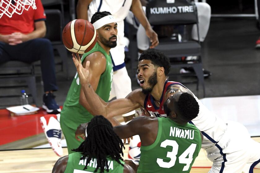 The United States' Jayson Tatum drives against Nigeria during an exhibition game July 10, 2021, in Las Vegas.