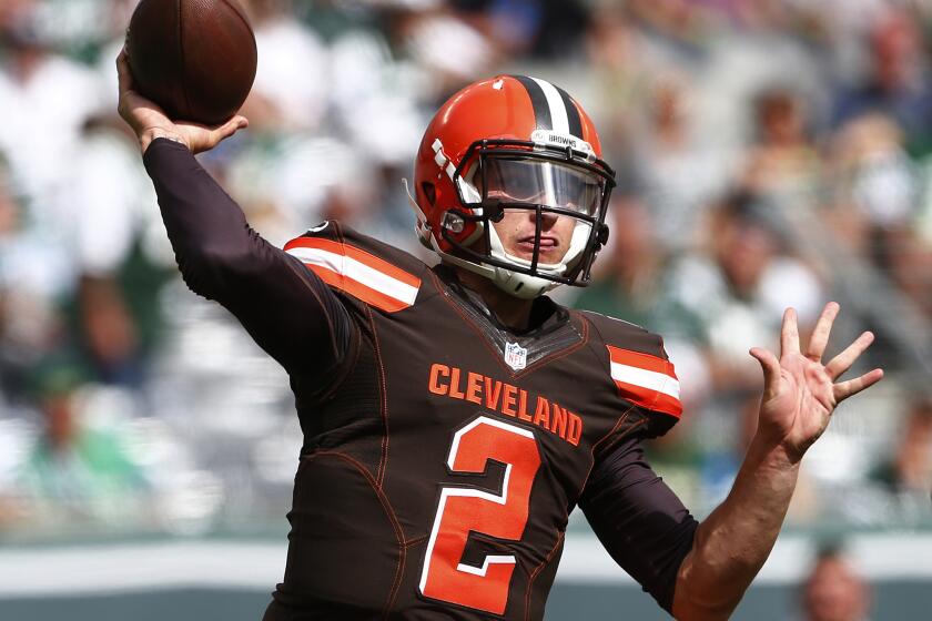 Quarterback Johnny Manziel of the Cleveland Browns passes against the New York Jets during the first quarter at MetLife Stadium in East Rutherford, New Jersey on September 13, 2015.