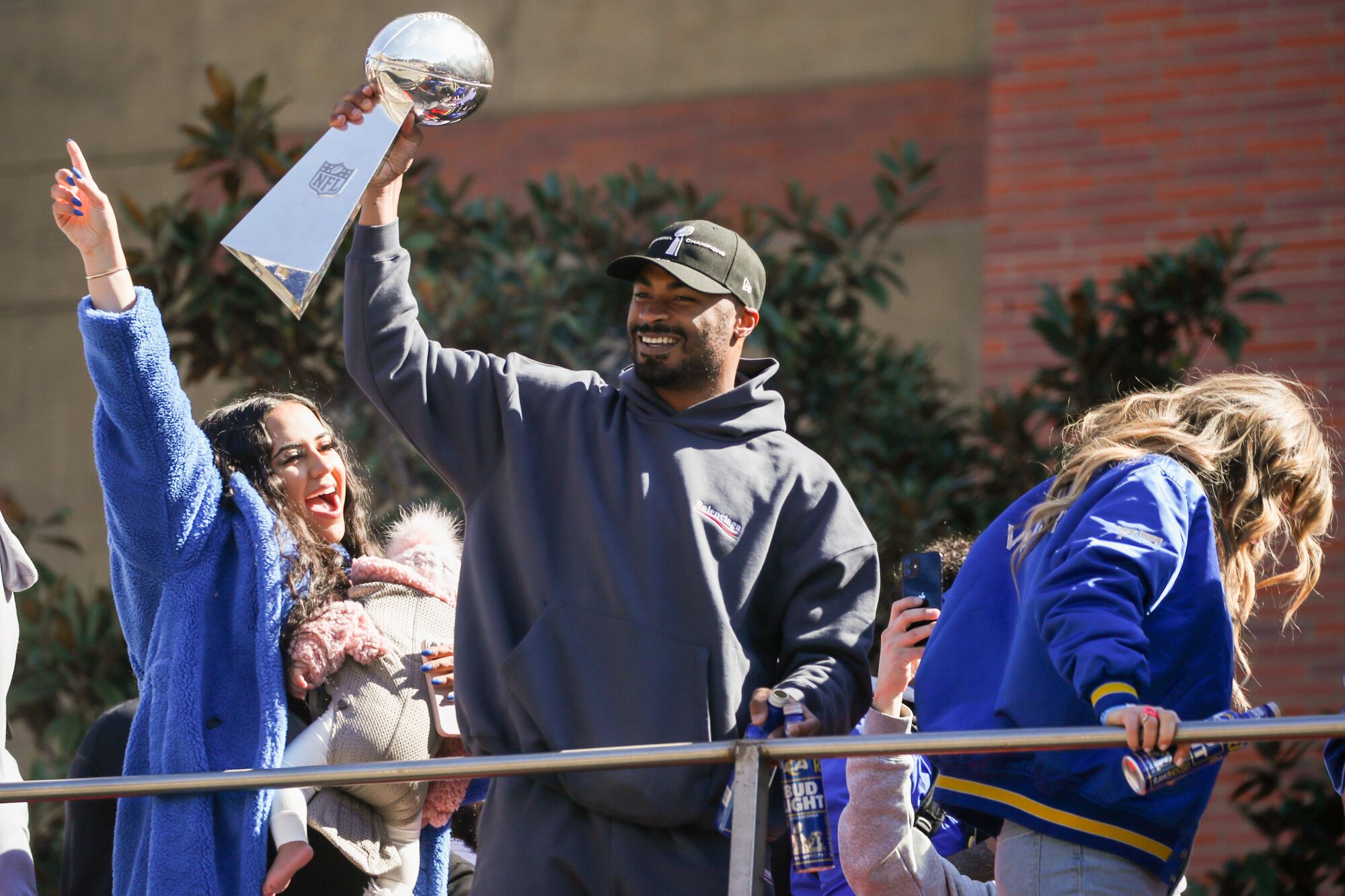 Robert Woods celebrates with the Lombardi Trophy during the Rams parade.