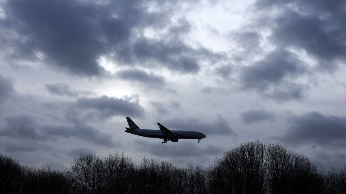 Drones in the sky and passengers on the ground: Gatwick briefly halts flights once - Los Angeles Times