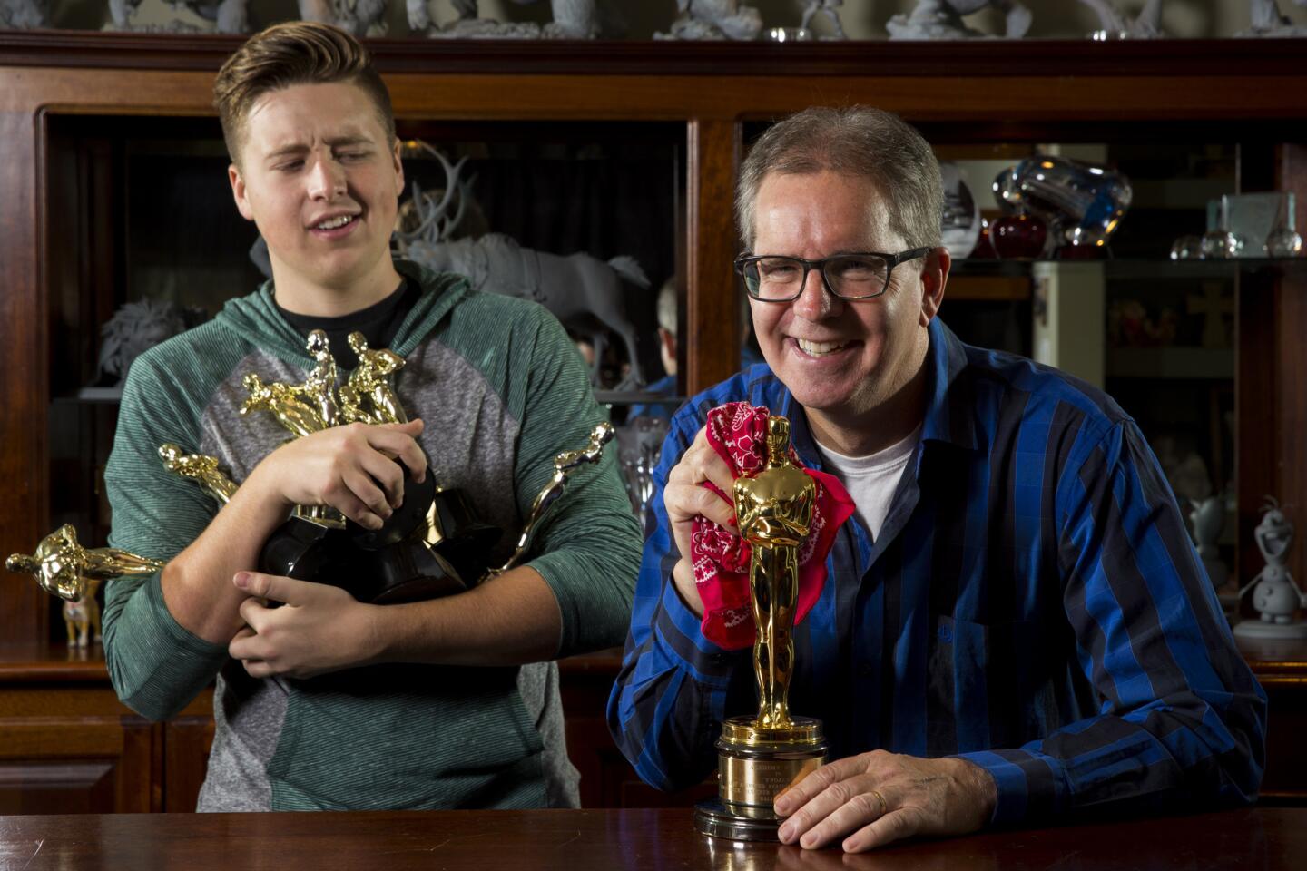 Chris Buck: His Oscar for co-directing "Frozen" with Jennifer Lee shares a place of honor with the statues his sons won acting in high school. He's pictured here with son Reed, 18.