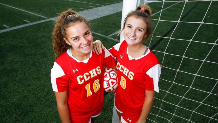 Seniors Casey Ocon (left), who has committed to Cal State Northridge, and Emali MacKinnon, who has committed to Utah, will try to bring another girls soccer championship to Cathedral Catholic.