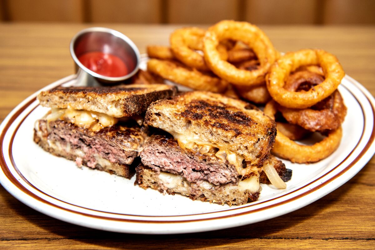 Patty Melt with onion rings at Clark Street Diner.