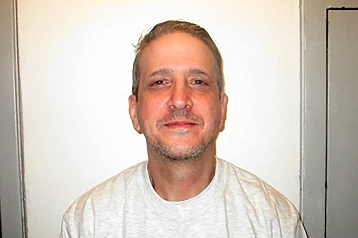 FILE - In this Feb. 19, 2021, photo provided by Oklahoma Department of Corrections shows Richard Glossip. More than 60 Oklahoma lawmakers are urging the state attorney general to join their request for a new evidentiary hearing in the case of death row inmate Richard Glossip. The group of 61 state legislators includes many Republicans who support the death penalty but question whether Glossip is guilty. (Oklahoma Department of Corrections via AP, file)