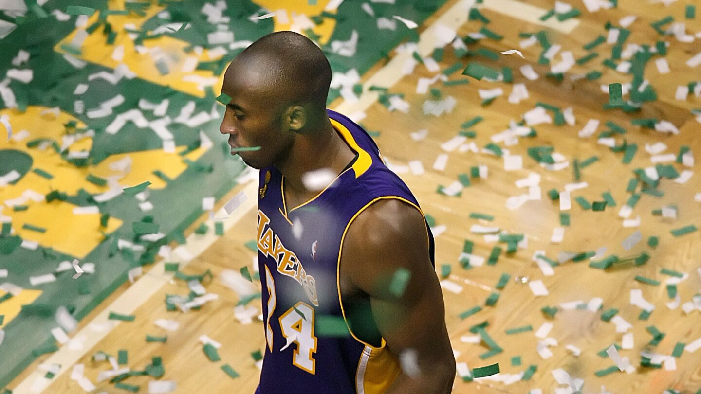 Lakers star Kobe Bryant walks off the court after a championship loss to the Boston Celtics in Game 6 of the 2009 NBA Finals.