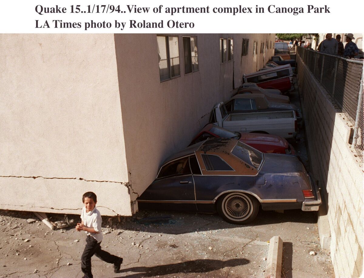 The upper stories of an apartment building in Canoga Park collapsed onto the ground floor in the 1994 Northridge earthquake.