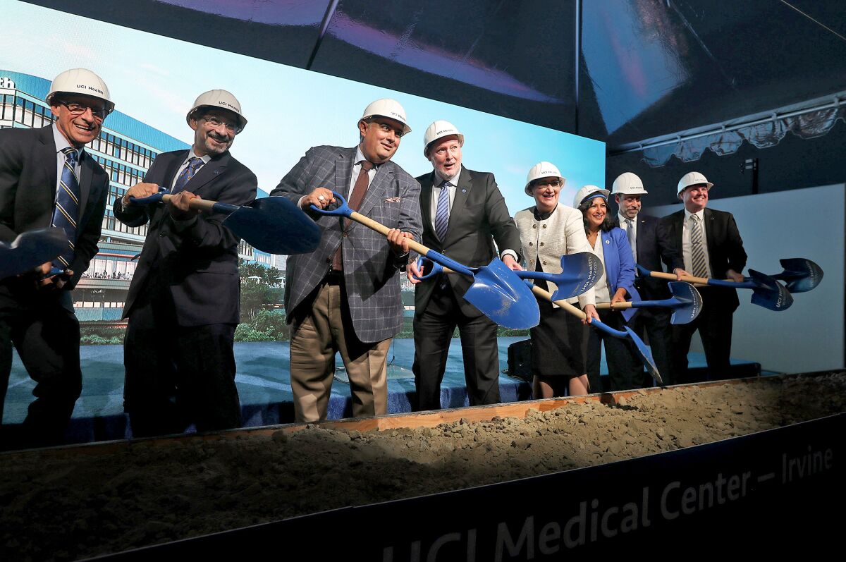 UCI health officials Monday at a ground-breaking for a new $1.3 billion UCI Health and academic complex on the Irvine campus.