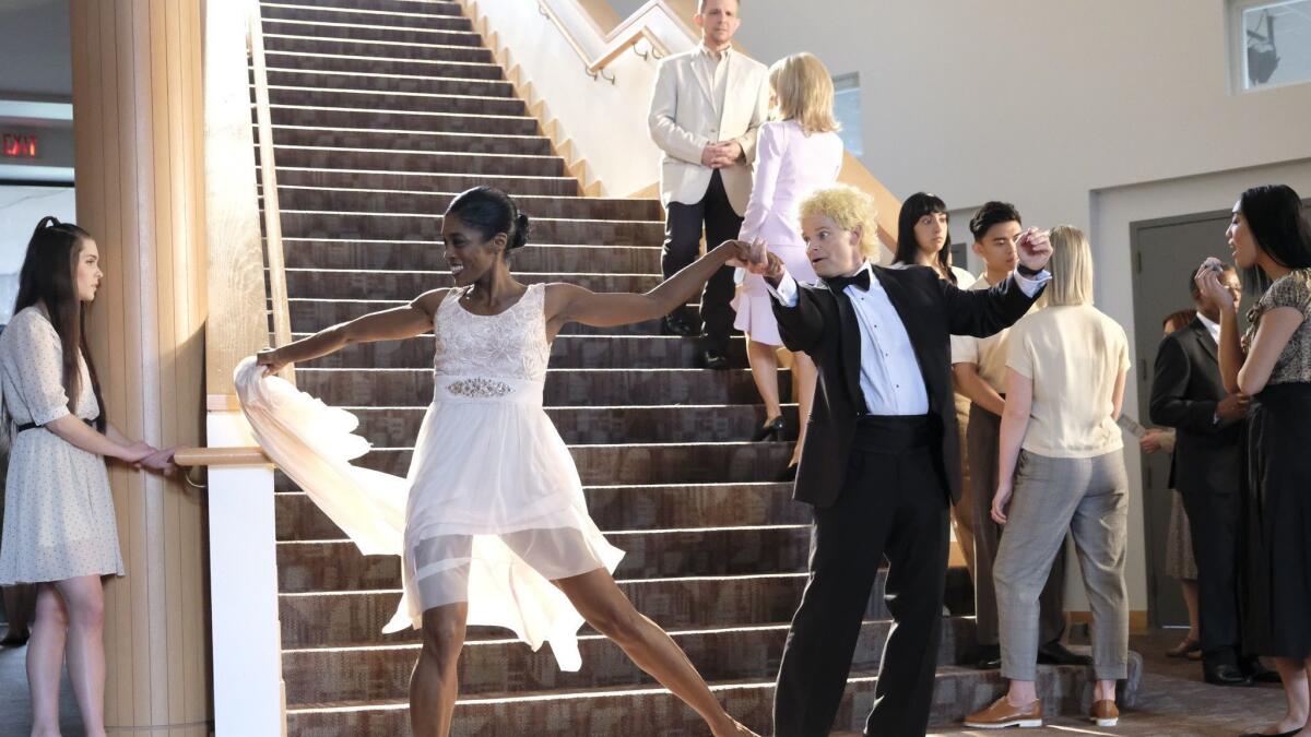 Steve Zahn, right center, in a dance sequence from "Valley of the Boom."