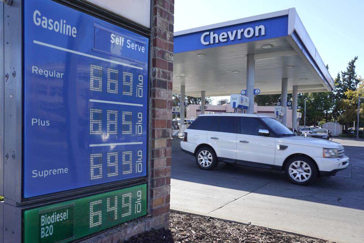 Gasoline prices are displayed at a gas station in Sacramento in September.