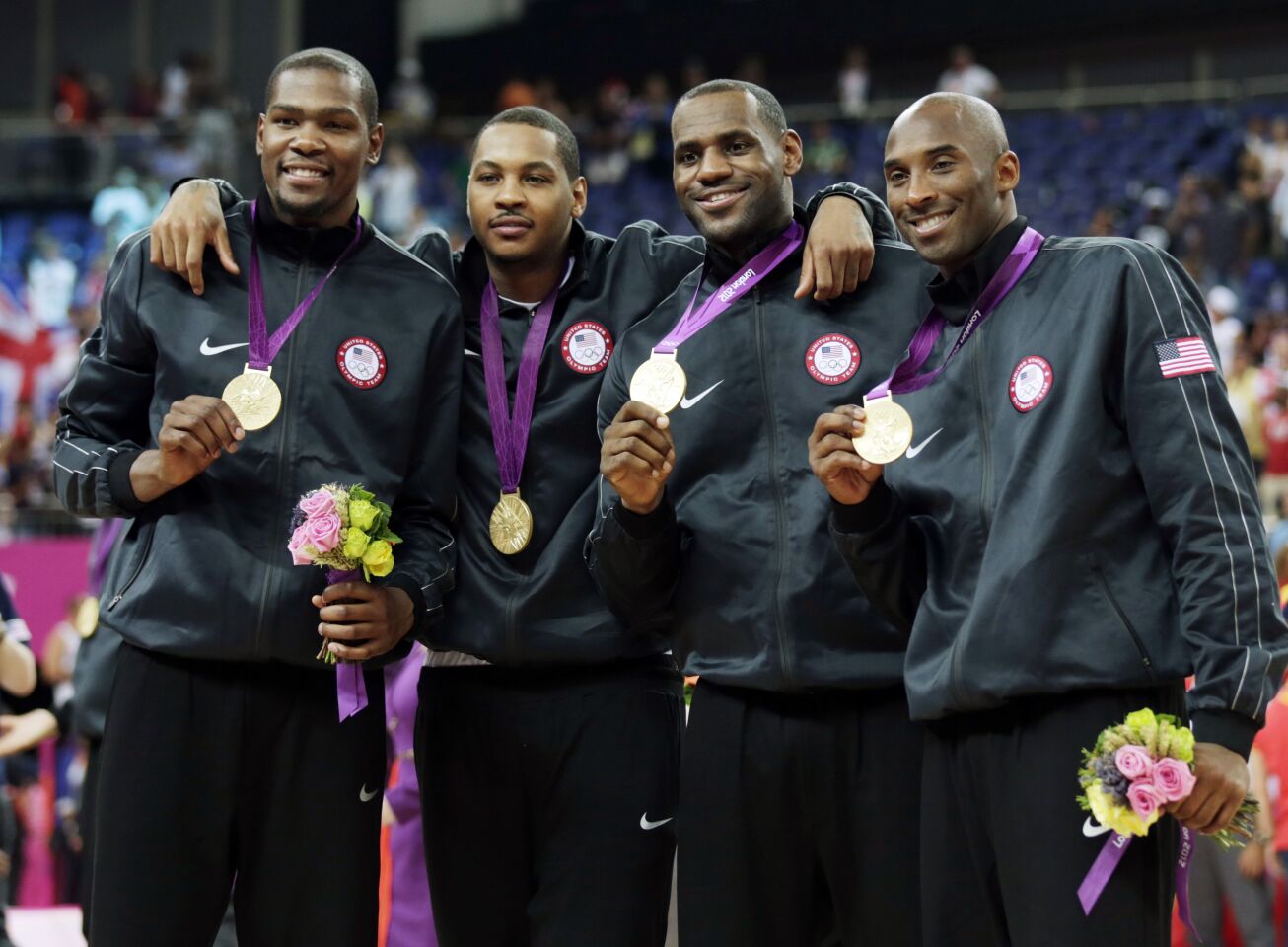 Team USA players, from left, Kevin Durant, Carmelo Anthony, LeBron James and Kobe Bryant with their gold medals at the 2012 Olympics.