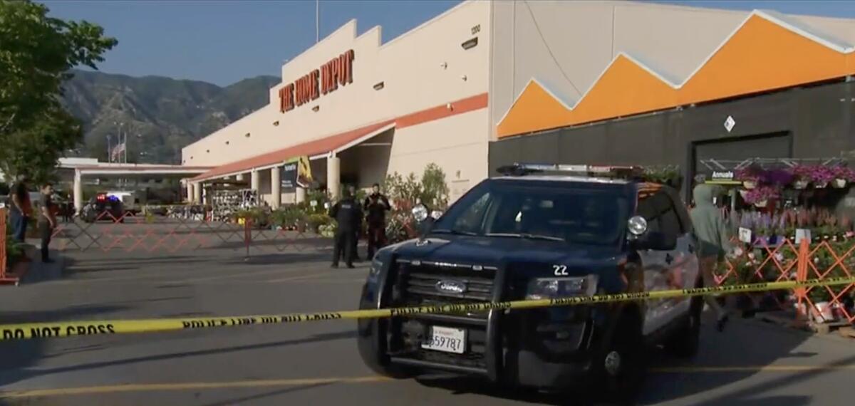 Police investigate following an officer-involved shooting in a Home Depot parking lot.