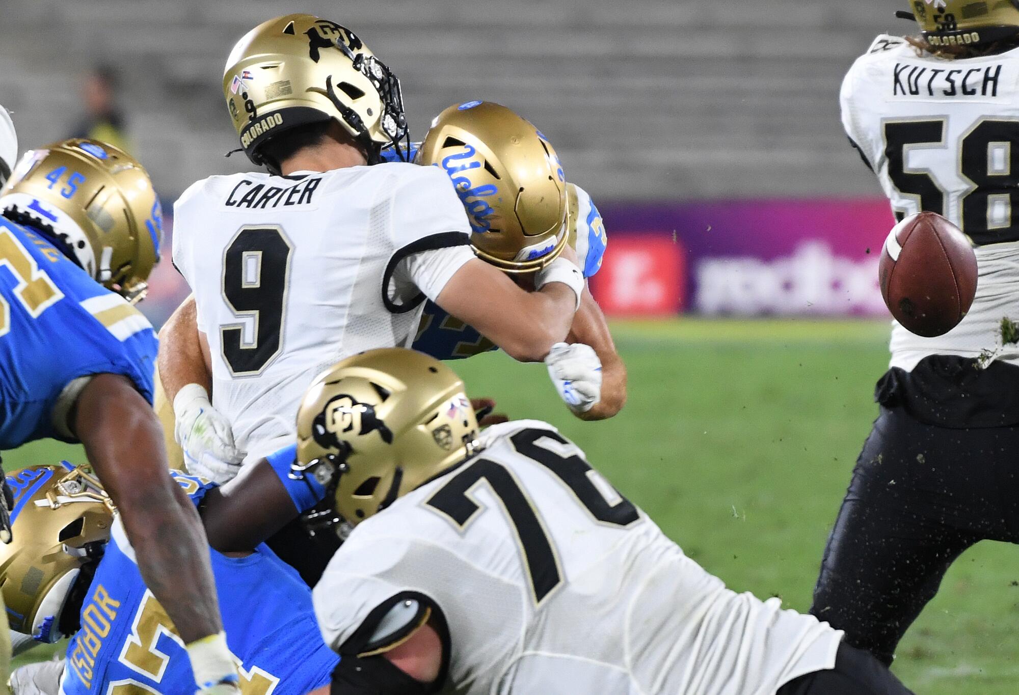 Colorado quarterback Drew Carter fumbles.