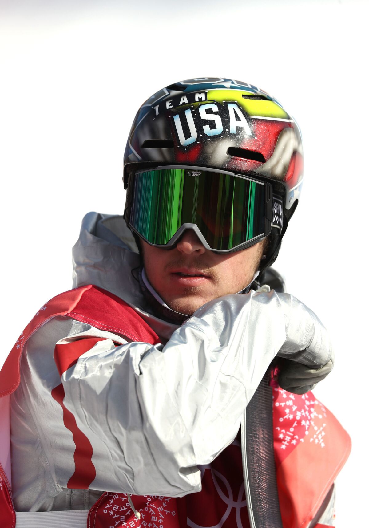 Chris Corning of the United States after his jump during the men's big air snowboard qualification.