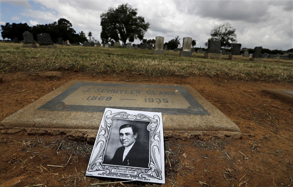 A picture of J. Schuyler Clark rests on his headstone at the Evergreen Cemetery in Boyle Heights.