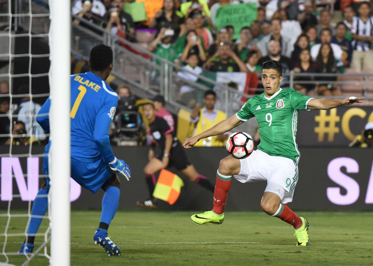 Mexico's Raul Jimenez (9) tries to score past Jamaica's Andre Blake during a Copa America Centenario match at the Rose Bowl.
