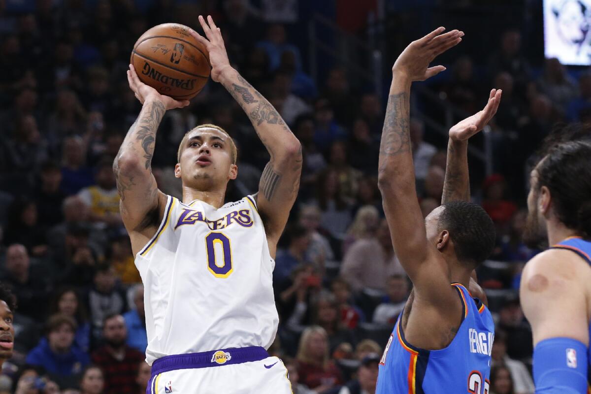 Kyle Kuzma attempts a shot against the Thunder while playing for the Lakers in 2020.