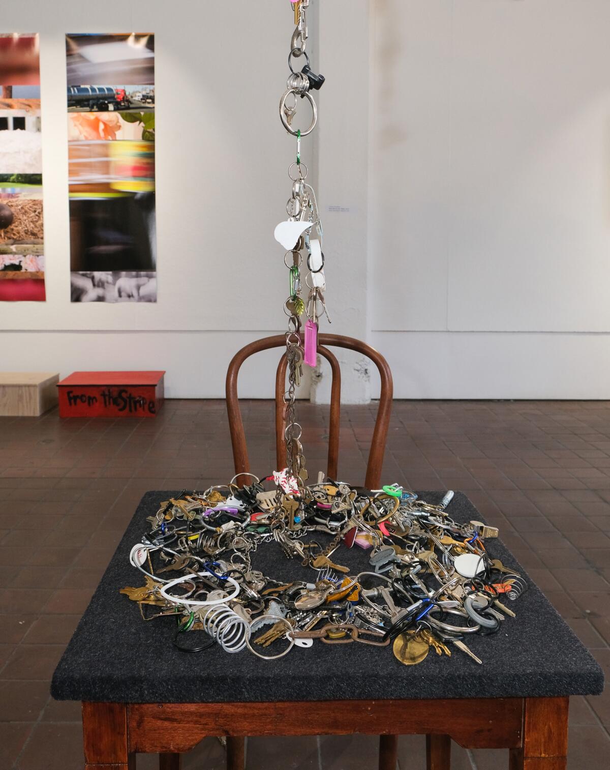 A string of keys dangling from the ceiling is part of Anna O'Cain's solo show, “There’s Never Just One."