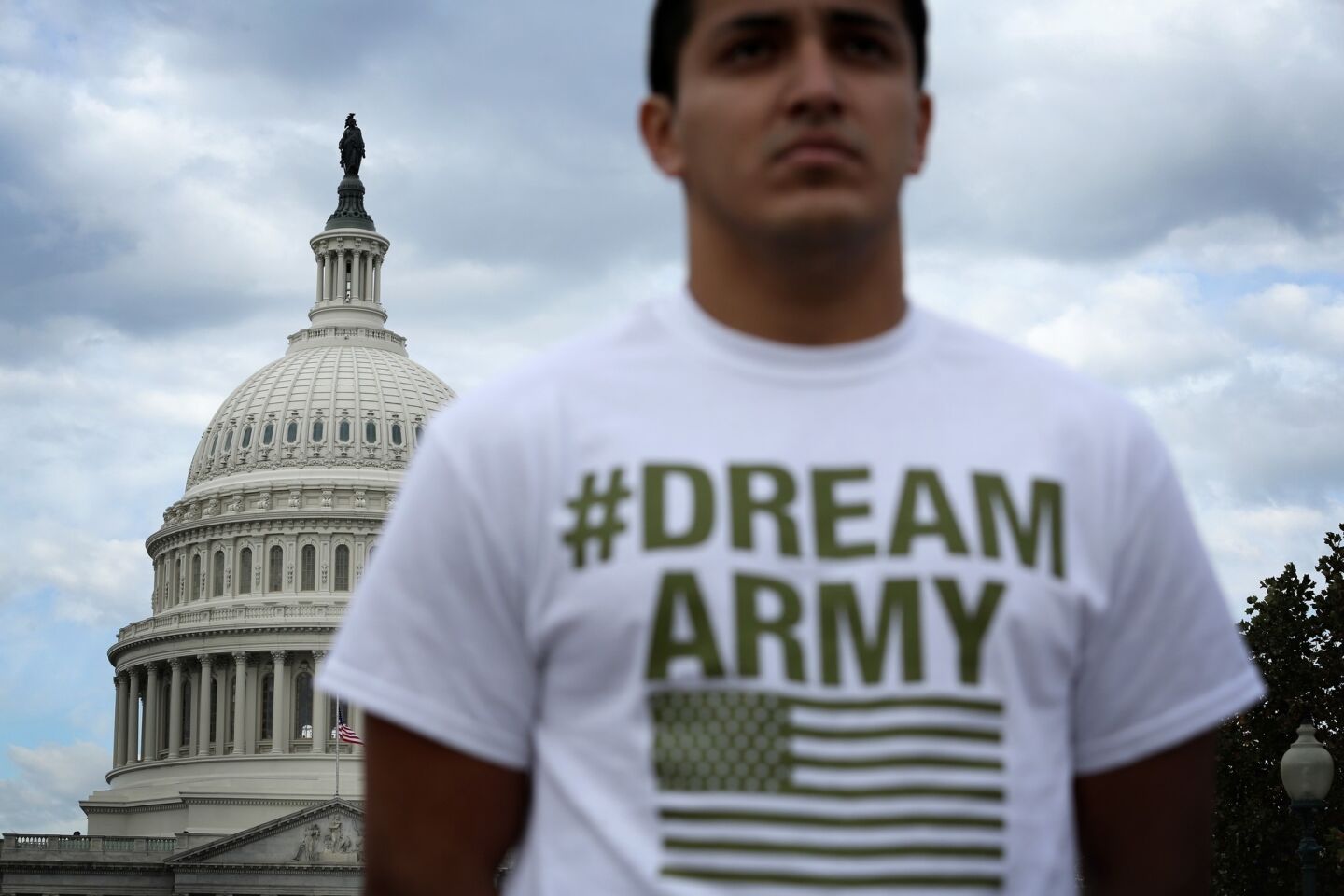 Lizardo Buleje of San Antonio stands in front of the U.S. Capitol during a rally calling for immigration reform.