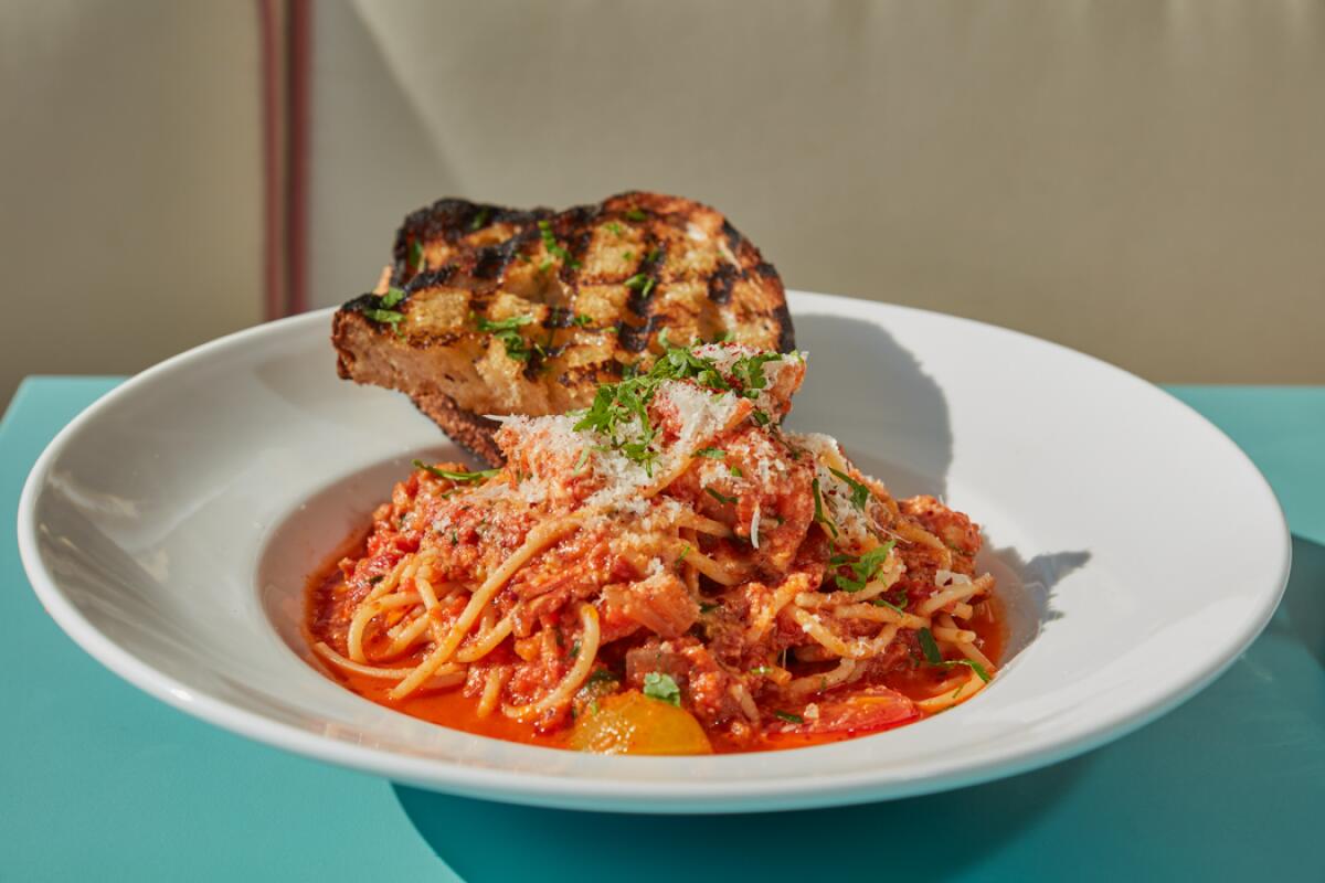 The spicy lobster spaghetti with grilled bread at Saltie Girl LA.
