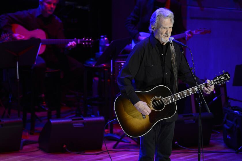 Kris Kristofferson, shown during a recent performance in Nashville, joined Johnny Cash biographer Robert Hilburn on Tuesday in Santa Monica to discuss the life and music of Cash and Roger Miller.
