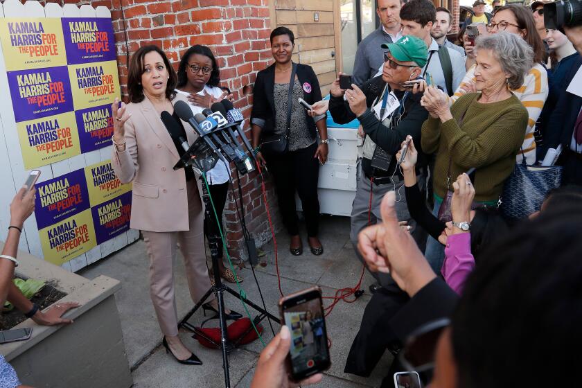 Mandatory Credit: Photo by JOHN G MABANGLO/EPA-EFE/REX (10429993n) US Senator and Democratic presidential candidate Kamala Harris (L) speaks to the media after the opening of her new office in Oakland, California, USA, 29 September 2019. Democratic presidential candidate Kamala Harris opens office in Oakland, USA - 29 Sep 2019 ** Usable by LA, CT and MoD ONLY **