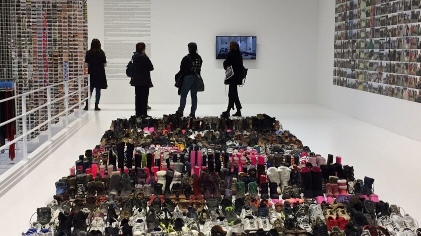 The shoes of Syrian refugees are part of Ai Weiwei's exhibit "Laundromat" in New York's Soho neighborhood.