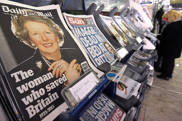 Newspapers with front-page coverage of the death of former British Prime Minister Margaret Thatcher are on display in central London.