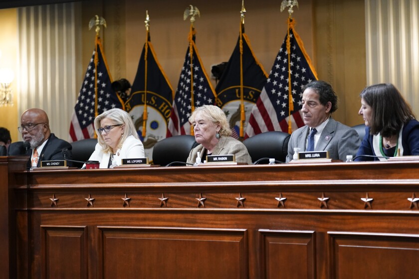 Chairman Bennie Thompson (D-Miss.) , left, and other members of the committee seated at the dais