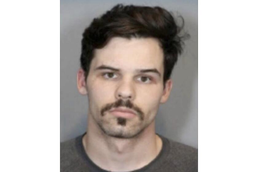 Booking photo of Ike Souzer. The Orange County District Attorney's Office is warning the public about Ike Souzer, an extremely dangerous and violent criminal who is once again at large after he walked away from a halfway house in Santa Ana.