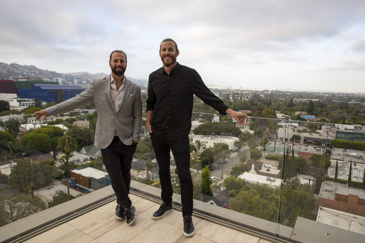 Developers Tyler Siegel, left, and John Irwin on the terrace at 8899 Beverly.