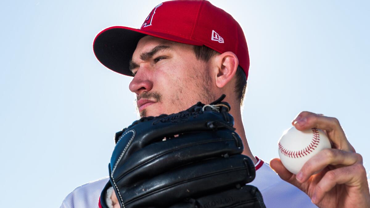 Andrew Heaney will throw off a mound Monday for the first time since having elbow ligament-replacement surgery last summer. (Rob Tringali / Getty Images)