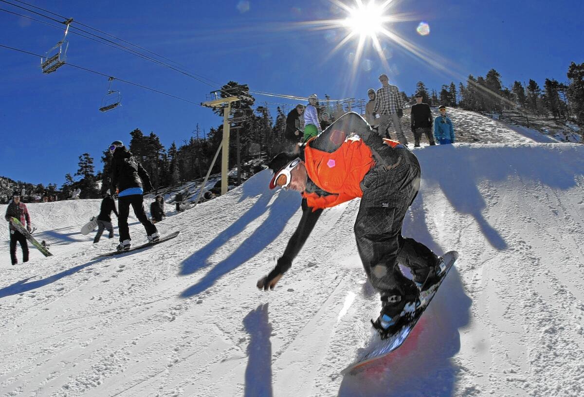 Marine Corps Lance Cpl. Jonathan Wescott, 23, takes a run at Bear Mountain in the San Bernardino Mountains in 2012. Bear Mountain and Snow Summit have been purchased by the operators of Mammoth Mountain.