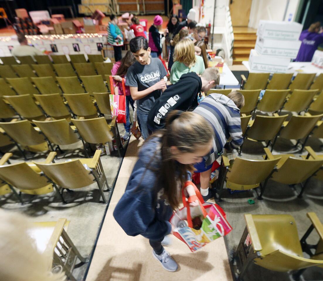 Photo Gallery: Burbank Coordinating Council holiday food and toy donation preparations for delivery