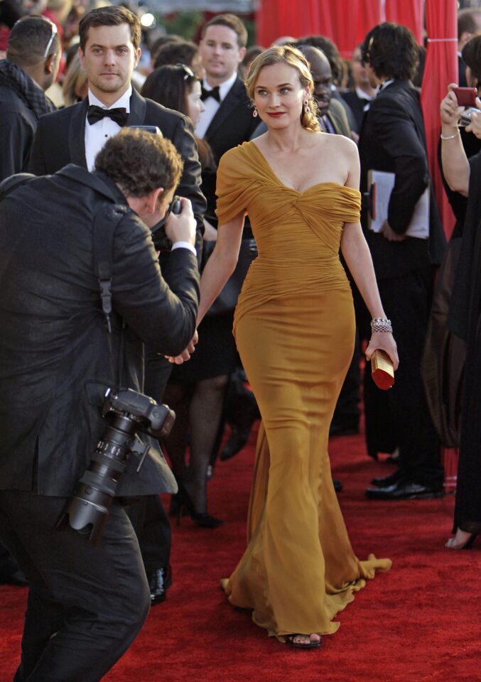 Diane Kruger chose a gown in an unexpected mustard-yellow color by New York-based designer Jason Wu. (He also made the frothy white dress that Michelle Obama wore to the inauguration parties.) Kruger's side braid was direct from the spring runways.