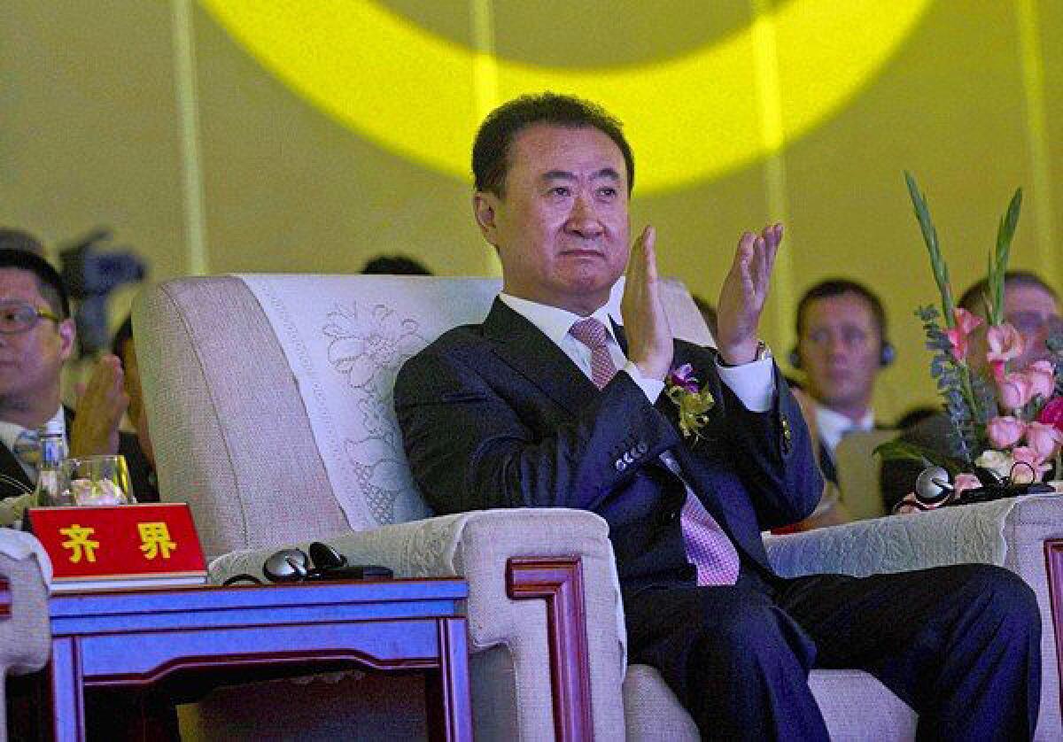 Wang Jianlin, the wealthiest man in China, is chairman of Dalian Wanda Group, which owns theater chain AMC Entertainment. The movie business is increasingly reliant on the international marketplace. Above, Wang attends an event at a Beijing hotel.