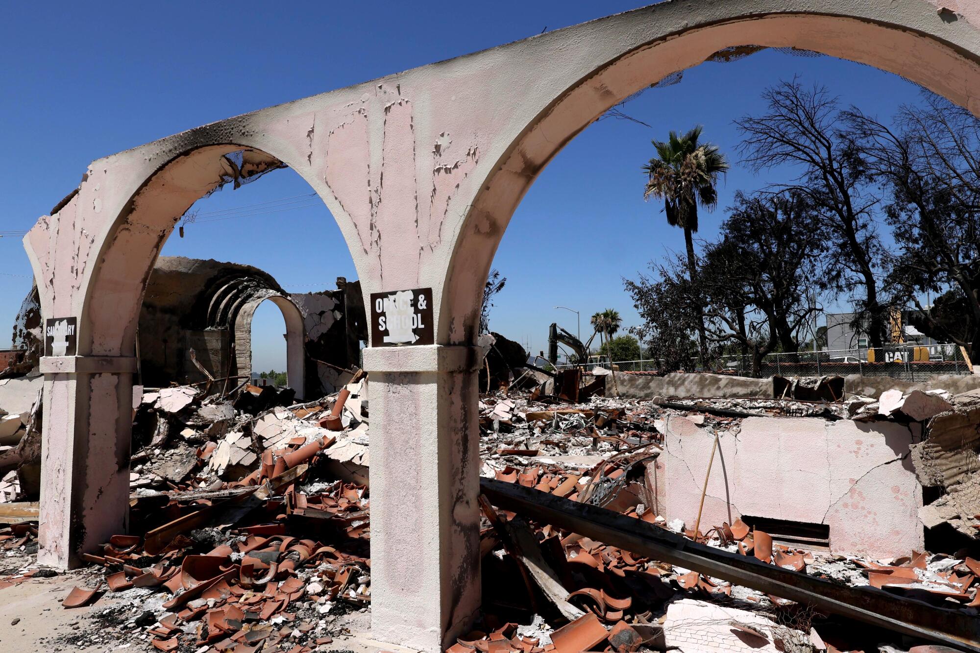 Altadena Community Church, destroyed in the Eaton fire 6 months ago, still needs to have debris cleared from the site.