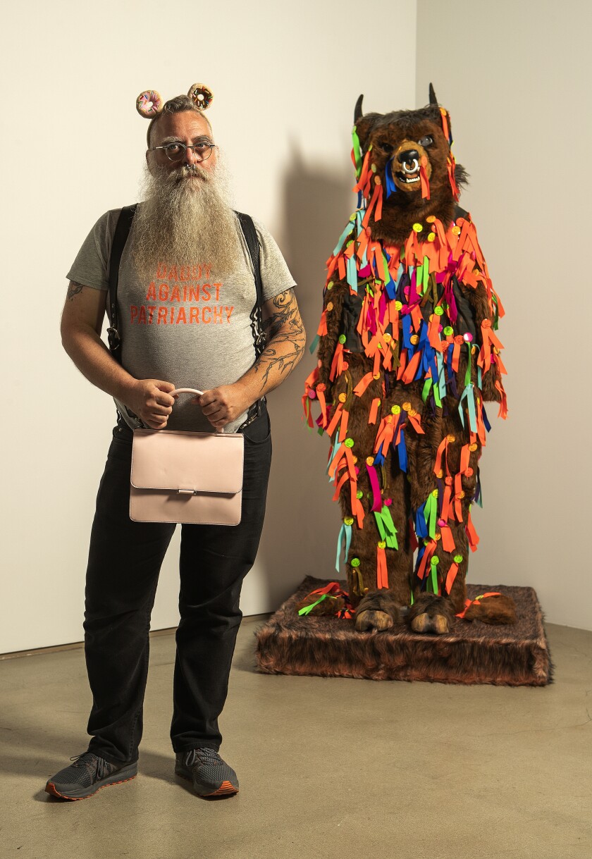 Artist Nayland Blake stands before the 2017 sculpture “Crossing Object (Inside Gnomen)” at the ICA LA.