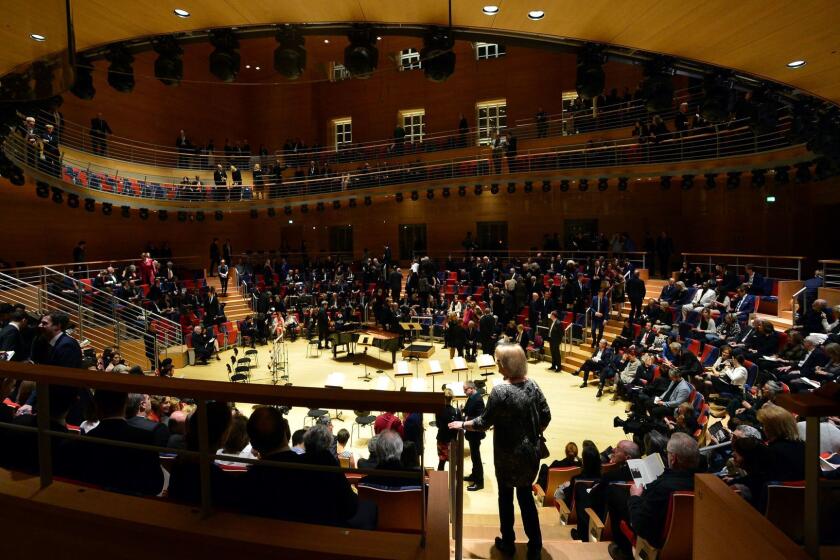 Guests arrive for the opening concert at Pierre Boulez Hall in Berlin.
