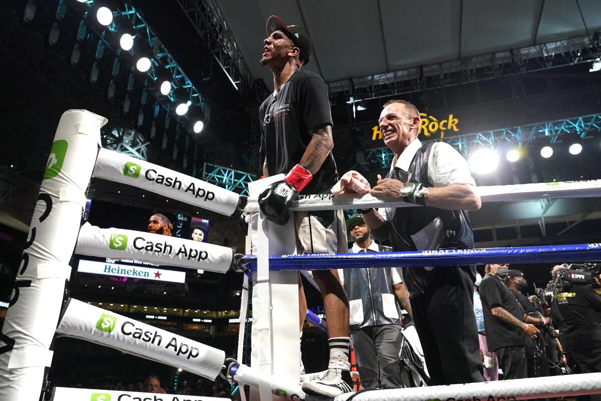 Luis Arias reacts after winning a middleweight boxing match 