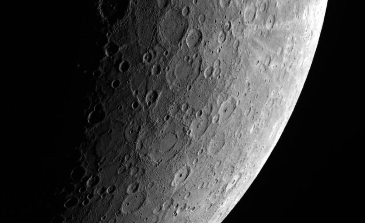 The planet Mercury reflects only one-third of the amount of light that the moon reflects. At last, scientists may know why.